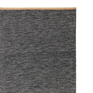 Design House Stockholm Bjork rug in dark grey with leather edging