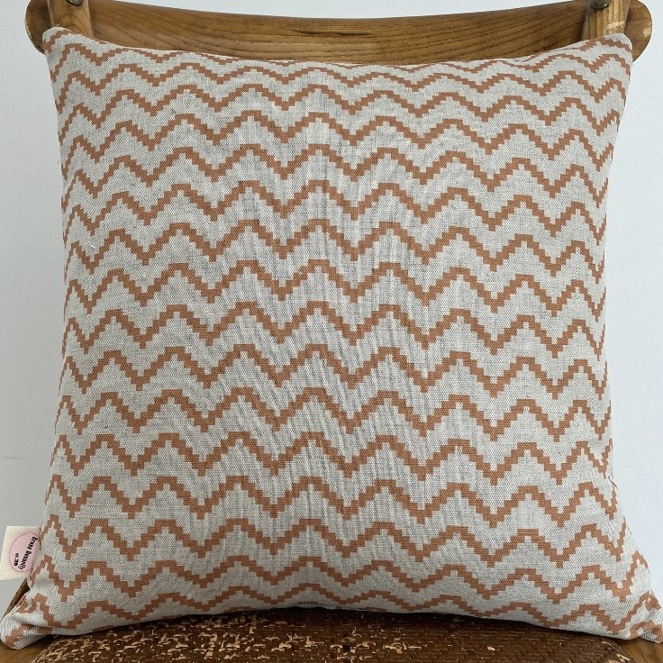 zig zag orange cushion in a soft cotton weave