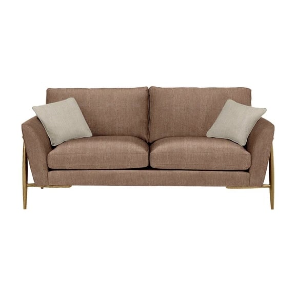 Ercol Forli blush sofa in retro living room