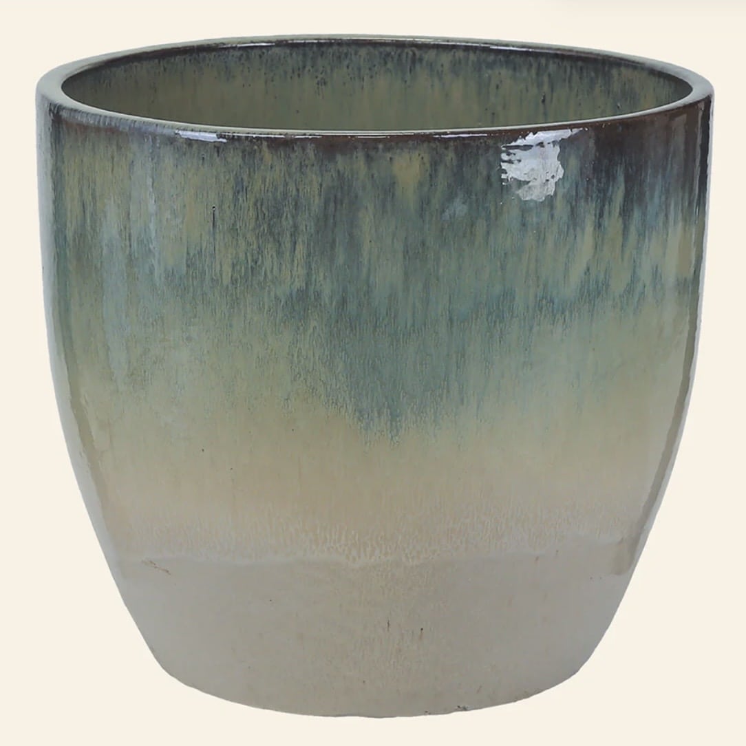 Celine large glazed indoor plant pot in teal and cream — statement pot for a tan leather sofa living room