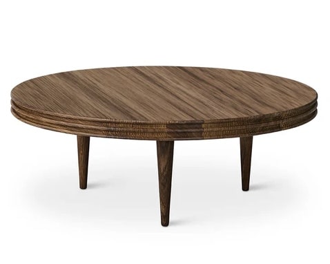 DK3 Groove round coffee table in oiled oak — dark wood coffee table for a tan leather sofa living room
