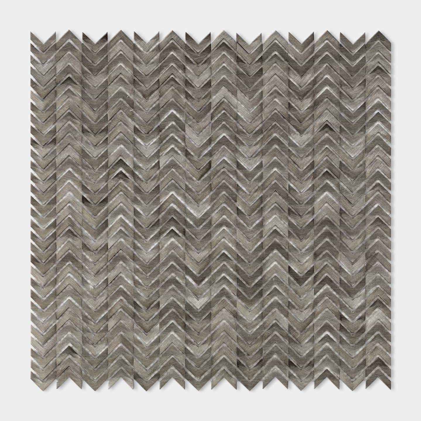 Gravity Aluminium Arrow metal herringbone tile in a black and white bathroom