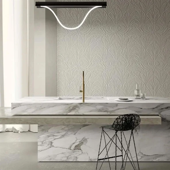 Moooi Carbon stool with an open black lattice shell at a marble kitchen island