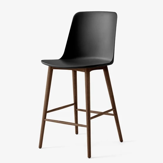 Black moulded shell breakfast bar stool with a high back on walnut legs