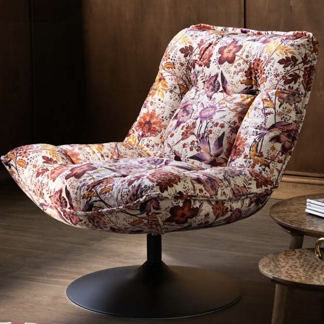 Floral velvet swivel accent chair in rust, plum and mustard blooms on a black pedestal base