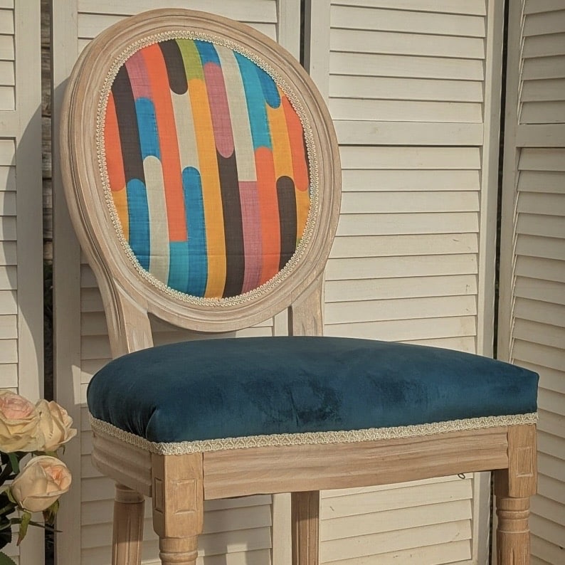 Louis-style medallion accent chair with a painterly multicoloured stripe back and teal velvet seat on a limed oak frame
