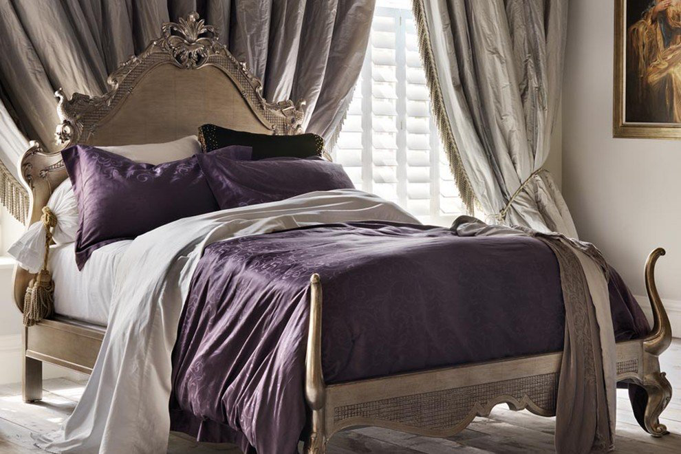 purple and grey bedroom with luxurious draping