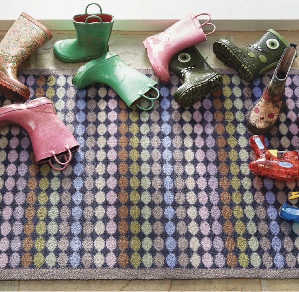 polka dot washable doormat with children's wellington boots