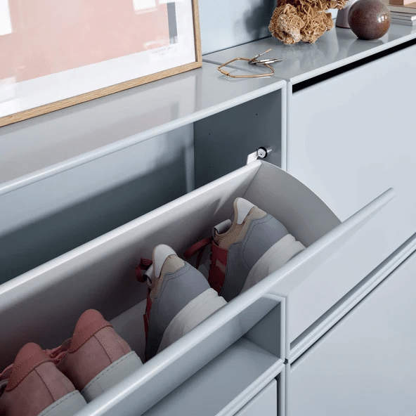 Montana gloss shoe storage cabinet drawer open showing trainers