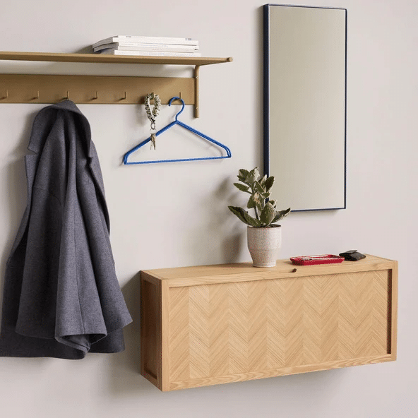 Hubsch herringbone oak floating shoe cabinet mounted on wall