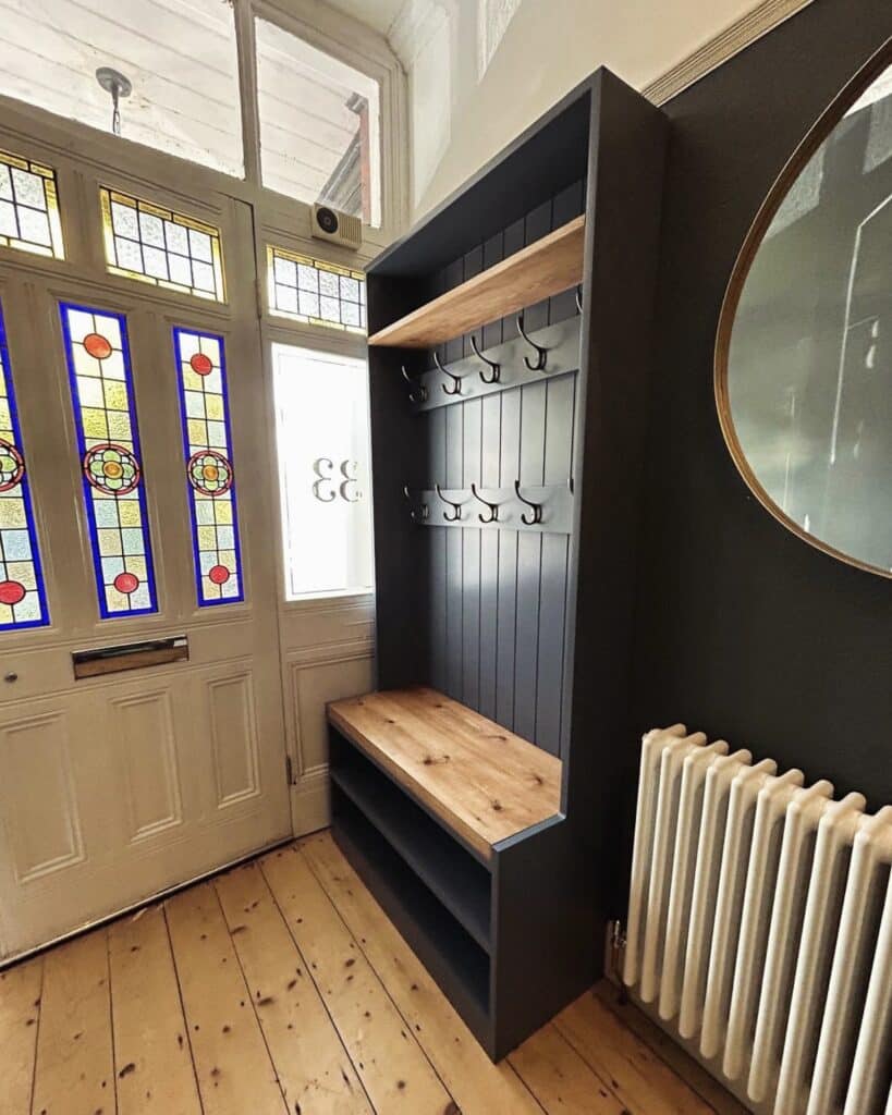 handmade painted navy hallway bench with shoe storage and coat hooks
