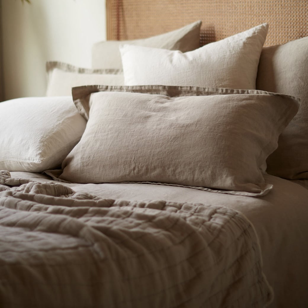 Natural 100% linen bedding in oatmeal for a modern beige bedroom