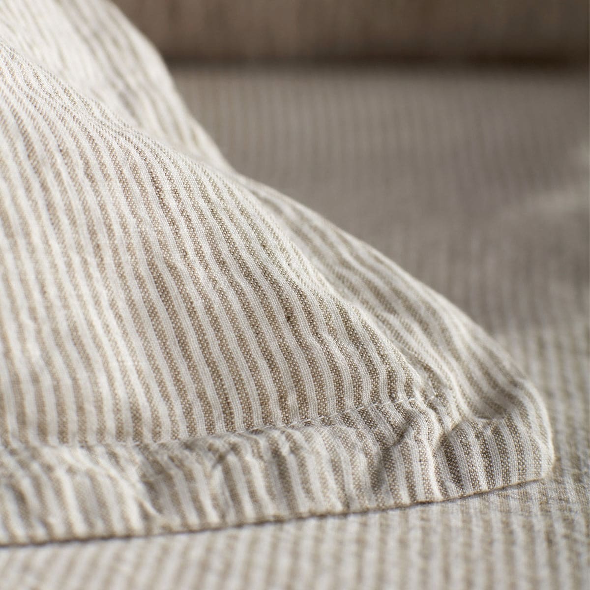 Natural Sid Stripe 100% linen bedding in oatmeal and off-white