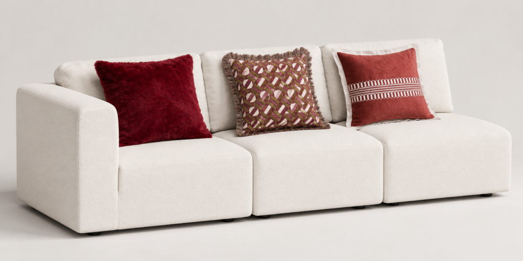 Burgundy cushions on white sofa