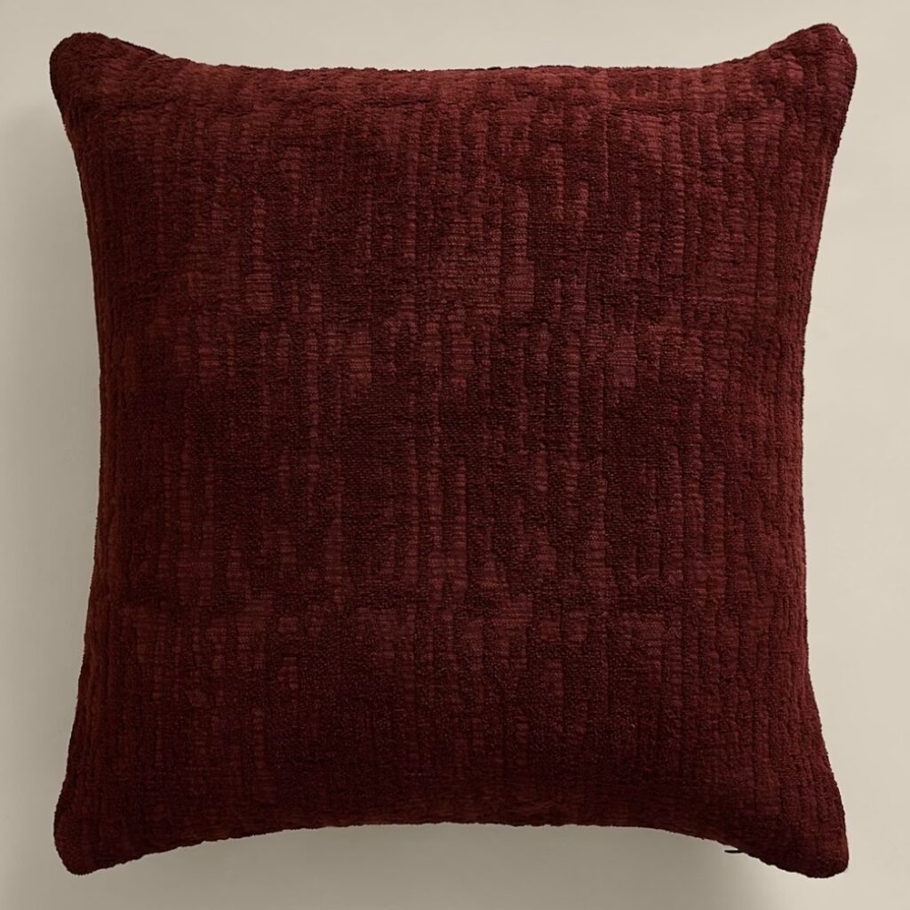Deep chestnut chenille jacquard cushion with textured weave