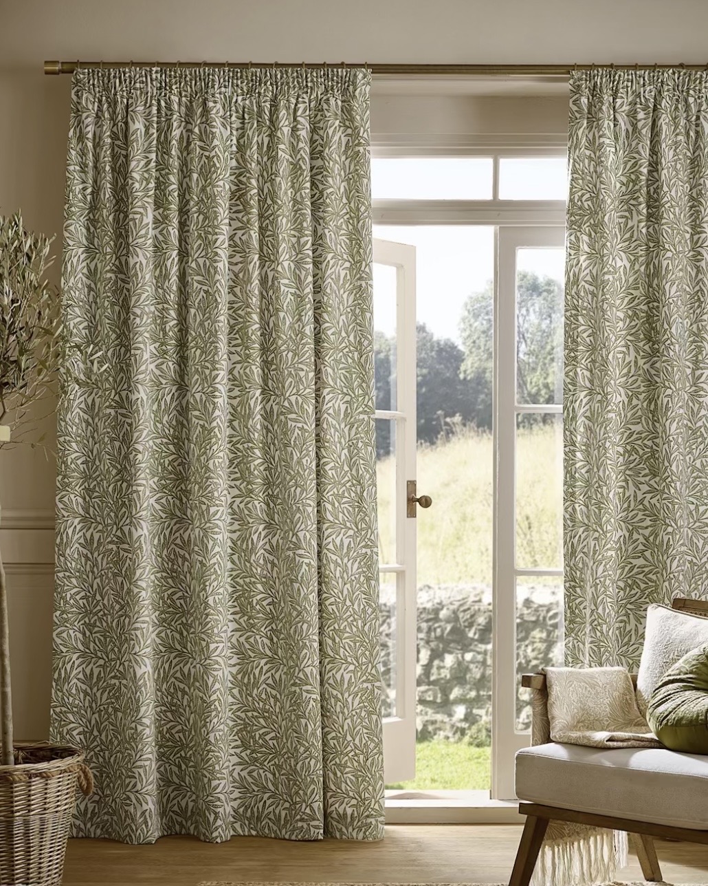 William Morris Willow print green curtains in a country-style room