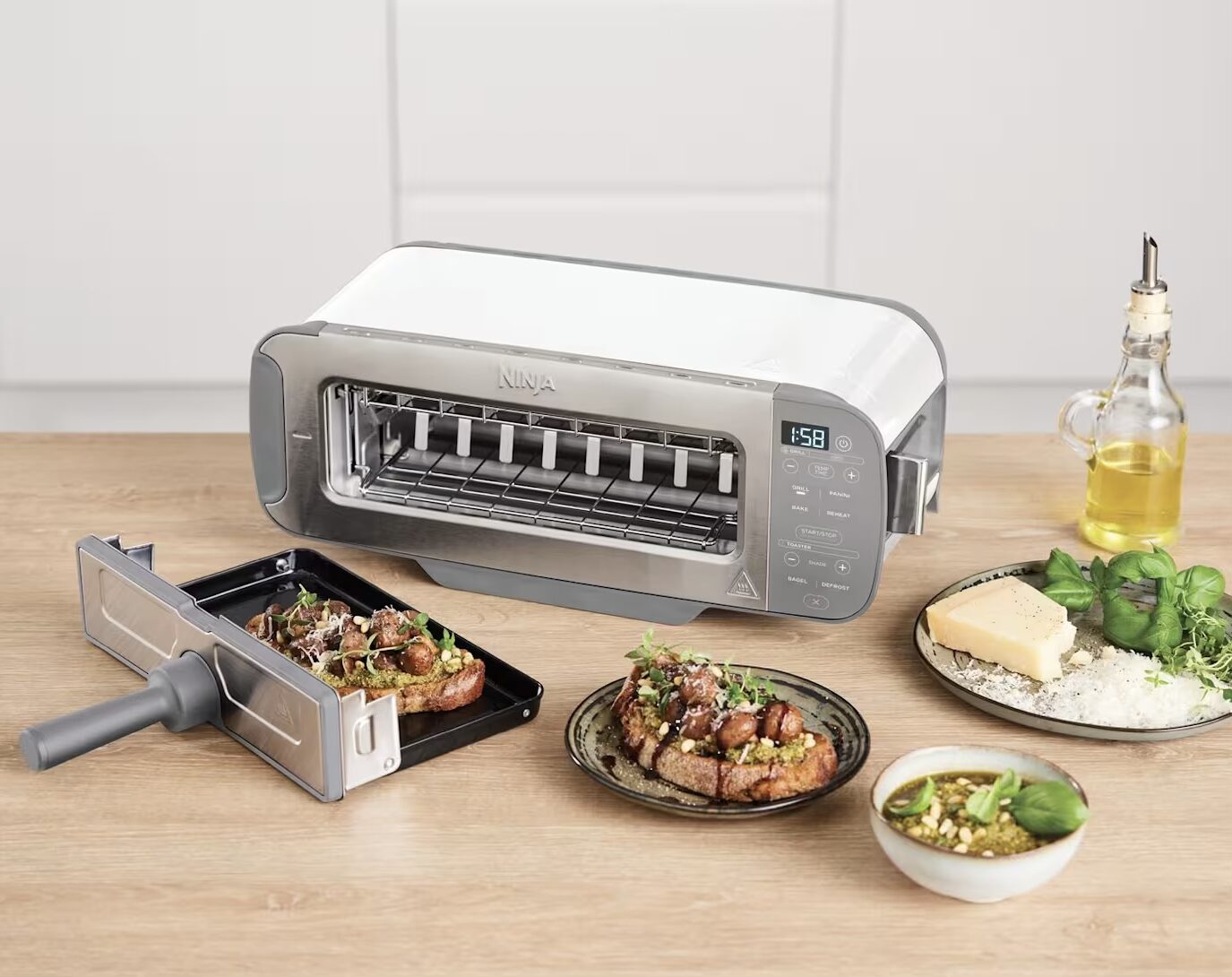 Ninja Foodi 3-in-1 toaster, grill and panini press on a kitchen worktop with toasted bruschetta