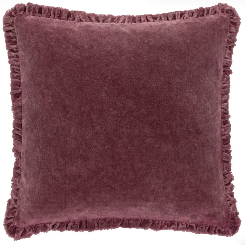Washed burgundy cotton velvet cushion with frayed ruffle trim
